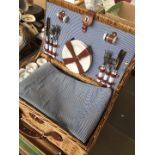 A wicker picnic hamper (complete)