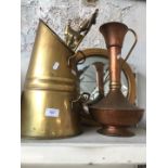 A collection of brass and copperware including coal scuttle, mirror and jug.