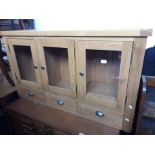 Top half of an oak display cabinet