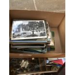 A box of vintage postcards