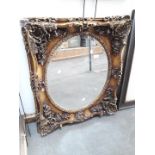 An ornate framed mirror