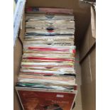 A box of 1960s 7" singles.
