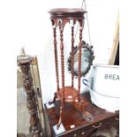 A reproduction twist pillar plant stand