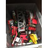 A box of die-cast toys to include Corgi, Matchbox, etc.