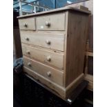 A pine chest of drawers