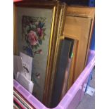 A box of pictures and frames