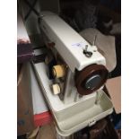 An electric Jones VX500 sewing machine, with pedal and lead in original case.