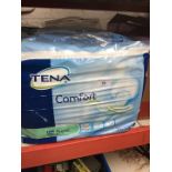 3 packs of Tena Comfort pads.