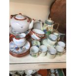 2 oriental teasets