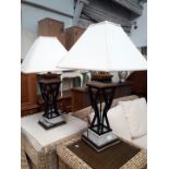 A pair of table lamps