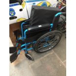 A folding wheelchair.