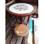 A small stool and a tripod table with tapestry top