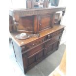 An oak court cupboard