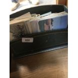 A letter rack with old postcards.