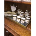 A wooden tray with brass handles, a collection of Japanese coffee set and a Royal Doulton plate.