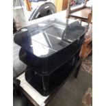 A black glass tv stand