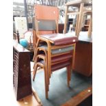 Four vintage school stacking chairs