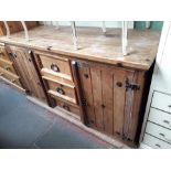 A rustic pine sideboard