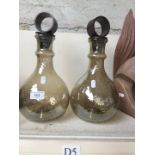 Pair of glass bottles with stopper