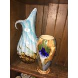 Glass coloured vase and a pottery vase