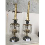A pair of 19th century gilt metal and lustre drop candlesticks