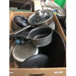 A box of kitchen utensils