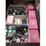 A box of mixed make-up items