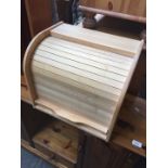 A wooden bread bin