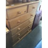 A pine chest of drawers