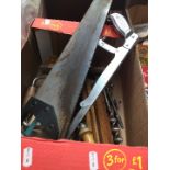 A box of misc tools to include saws, woodworking, old rulers, etc.