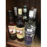 A collection of alcoholic beverages to include a bottle of vodka Smirnoff 1L, 2 bottles of The