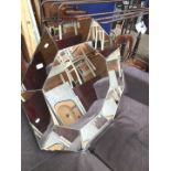 A large bevelled edge modern octagonal mirror