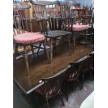 A refectory dining table and set of 6 chairs