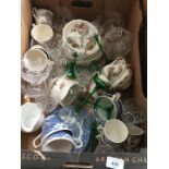 A box containing Johnson Bros "The Old Mill "tea service and various glassware