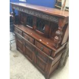 An oak court cupboard