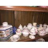 A shelf of various pottery