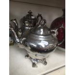 Two silver lustre teapots
