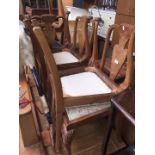 A set of 6 Maple dining chairs with burr walnut finish - one damaged.