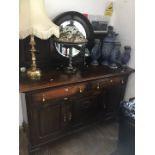 A 19th century oak mirror back sideboard