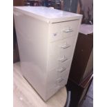 A small metal filing cabinet