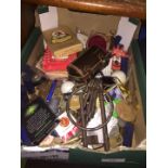 A box of collectables including big jail keys, coins, etc.