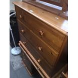 A pine chest of 3 drawers