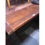 A Danish teak tile top table and 6 chairs