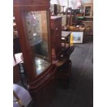 A yew wood corner display cabinet