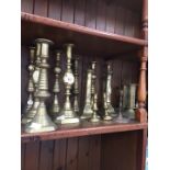 Selection of brass candlesticks