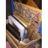 A box of pictures including original works and prints, various artists and sizes.