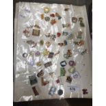 A collection of various badges