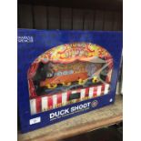 A boxed M&S duck shoot infra red fairground game
