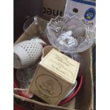 A box of glassware and pottery