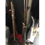 3 bundles of garden tools to include shovels, forks, brushes, etc.